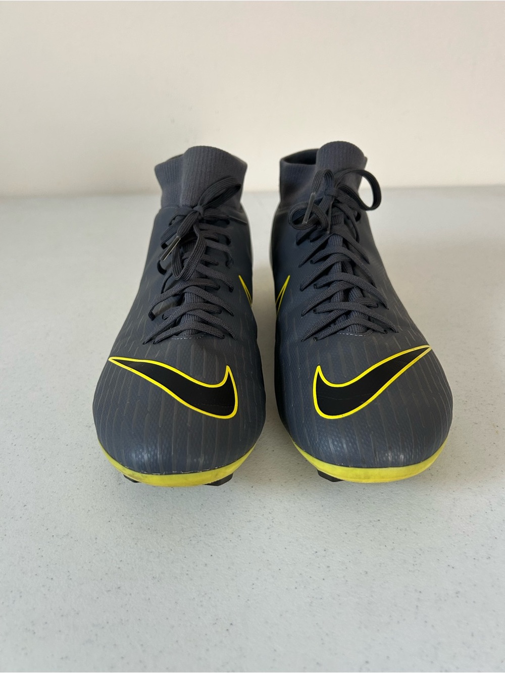 Nike Men’s Black Soccer Cleats with Yellow Swoosh